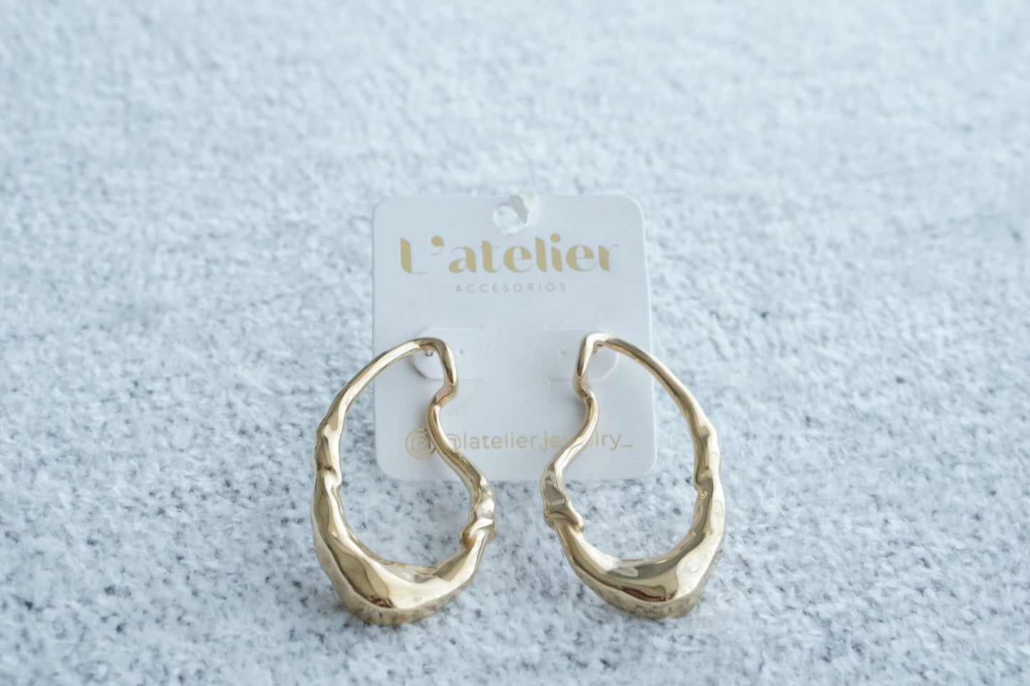 Aretes ovalo grande irregular acero
