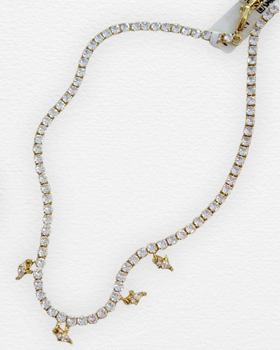 Collar tipo tennis con fondo dorado de chapa de oro y zirconias con colibris