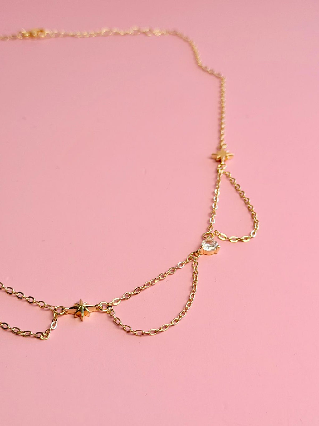 COLLAR DE CADENAS COLGANTE CON CIRCONIAS Y ESTRELLAS CH14K