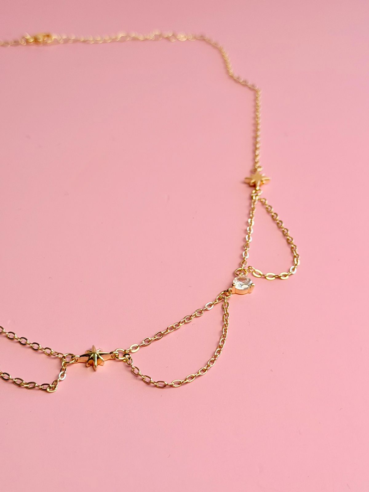 COLLAR DE CADENAS COLGANTE CON CIRCONIAS Y ESTRELLAS CH14K