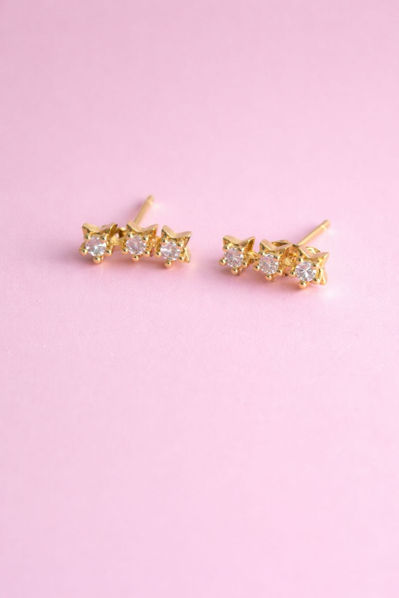 broquel chapa de oro 18k estrellas