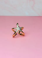 ANILLO AJUSTABLE CON ESTRELLA DE MAR TEXTURIZA