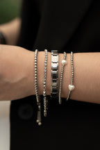 Pulsera elastica con perla y cuentas redondas