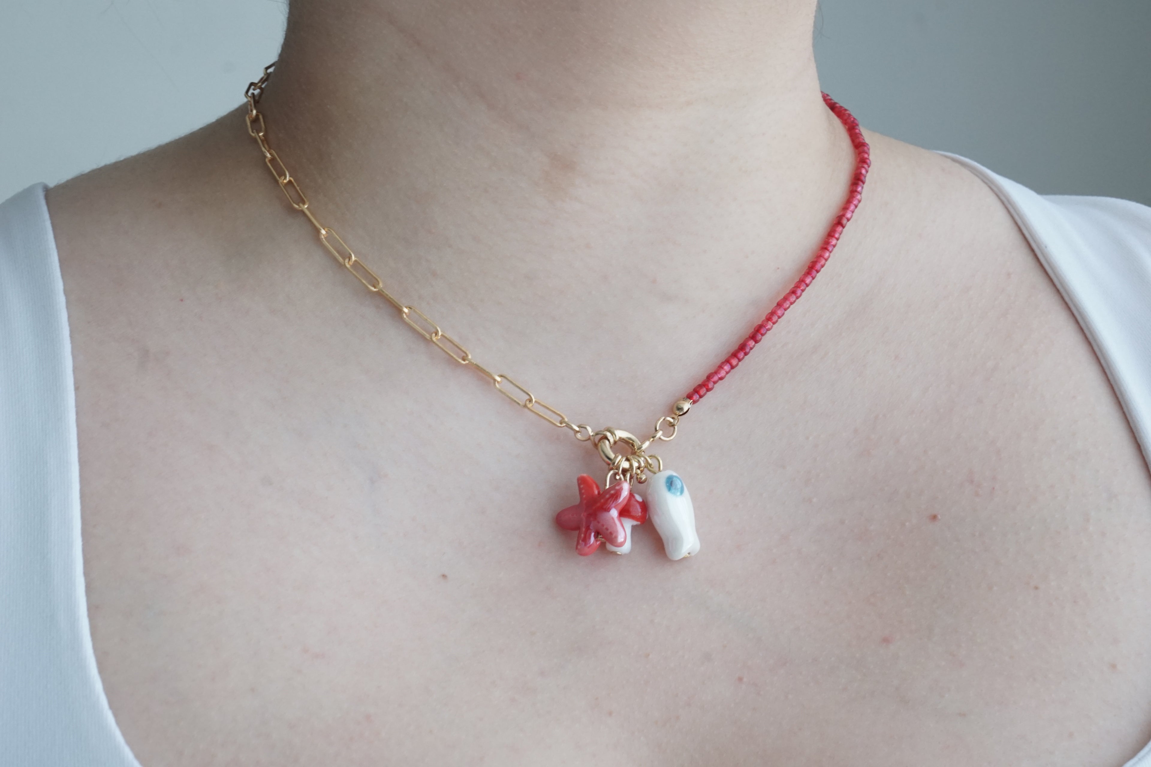 ceramic charms and steel necklace