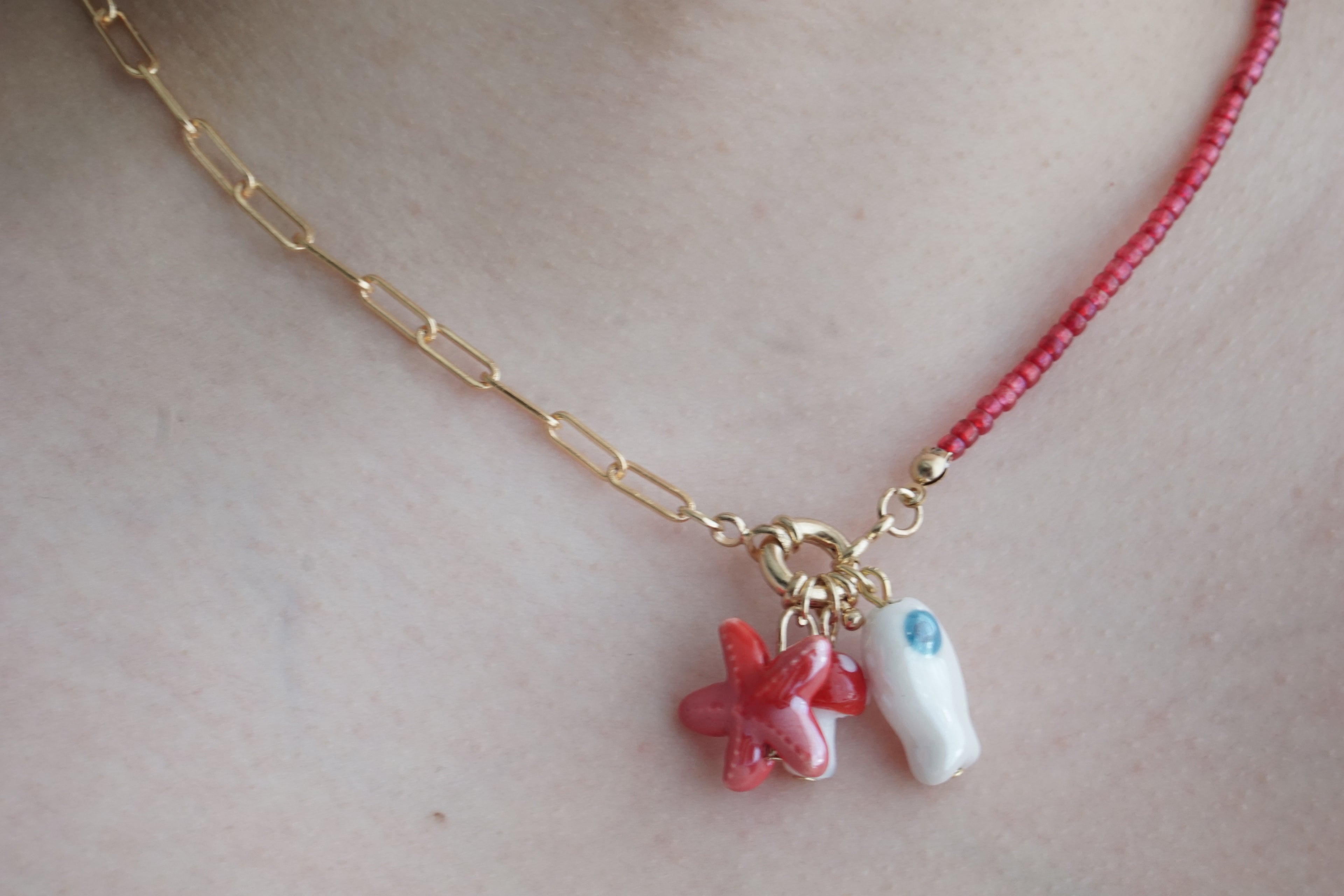 ceramic charms and steel necklace