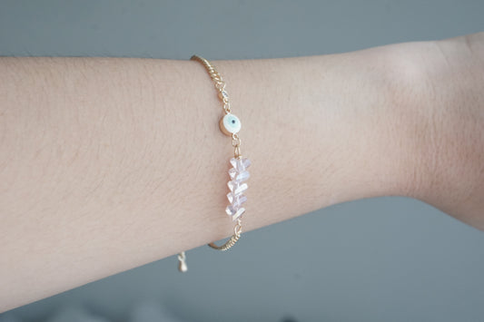 Twisted Cuban Bracelet with Pink Crystal Eye – Gold
