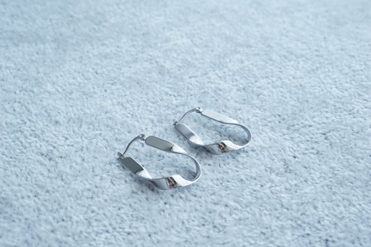 Twisted Irregular Rectangle Hoops – Silver