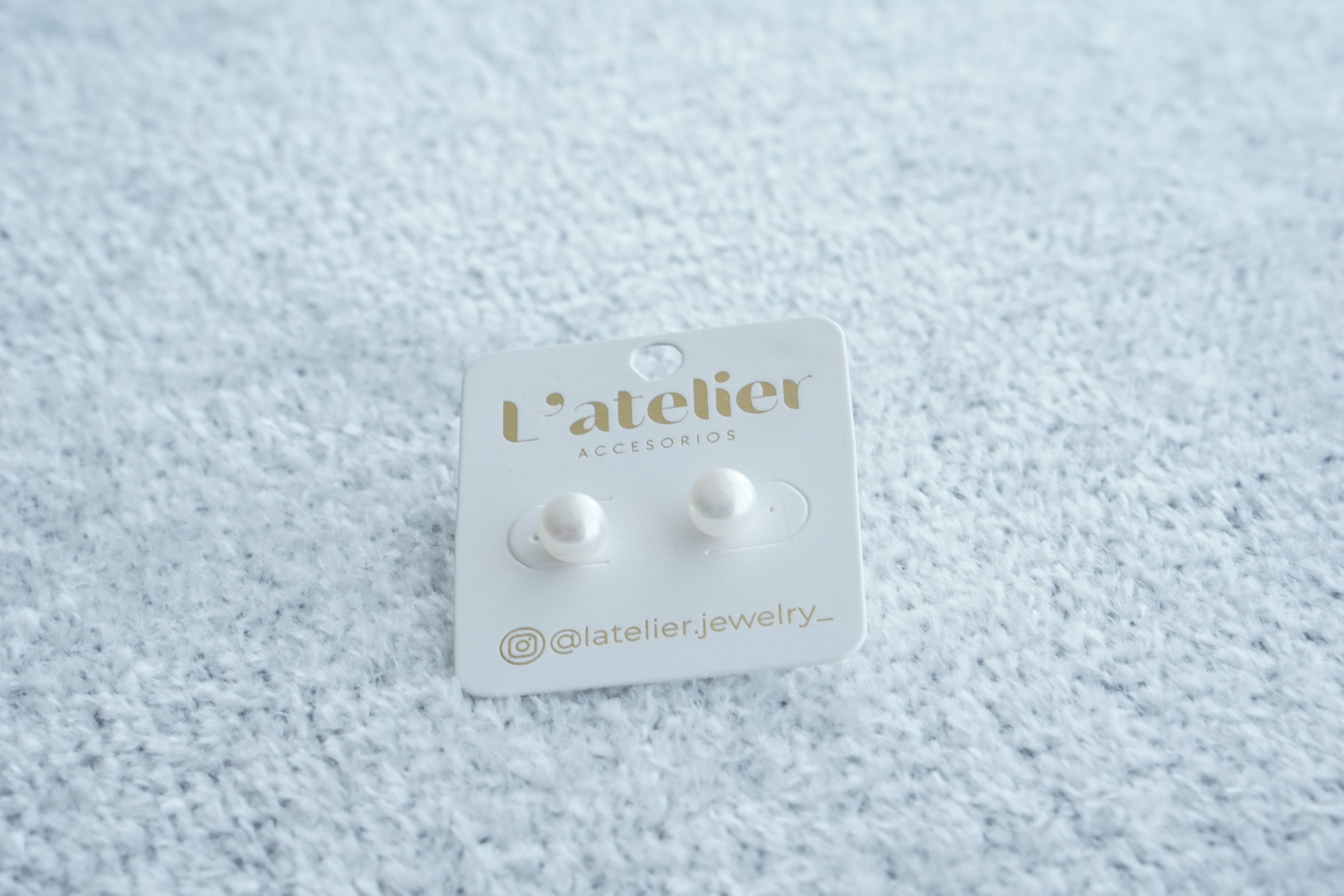 Aretes perla de rio con chapa de oro