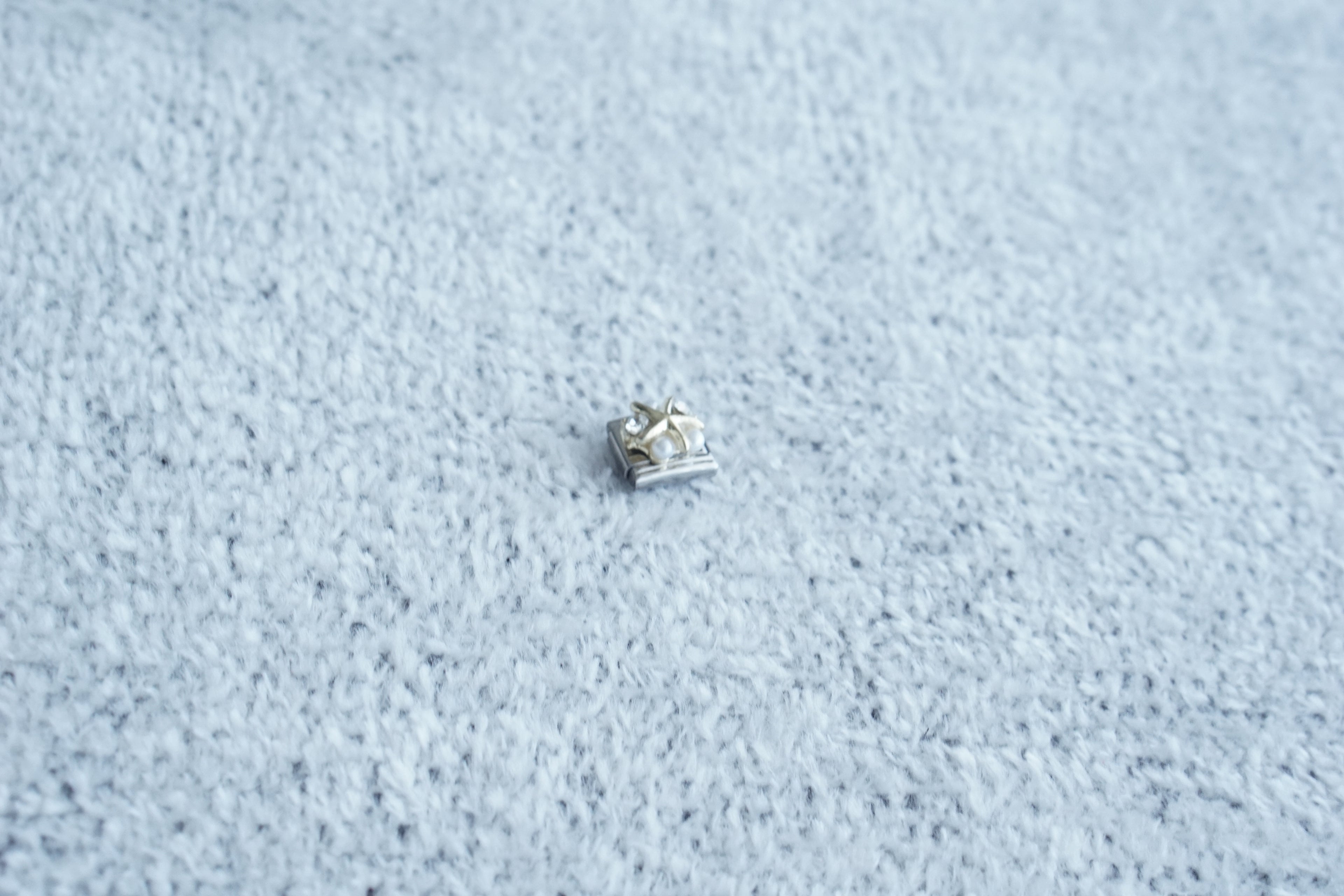 charm estrella brillo y perlas