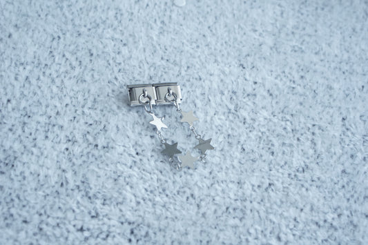 charm con colguijes plateado