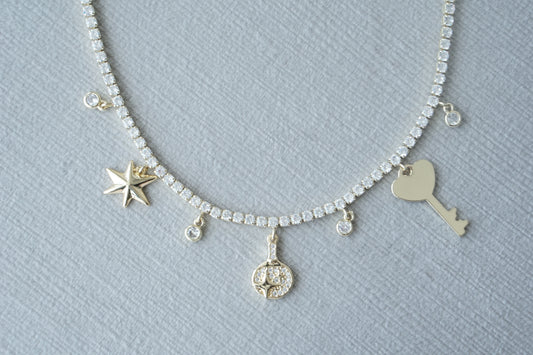 Collar key y corazon tennis