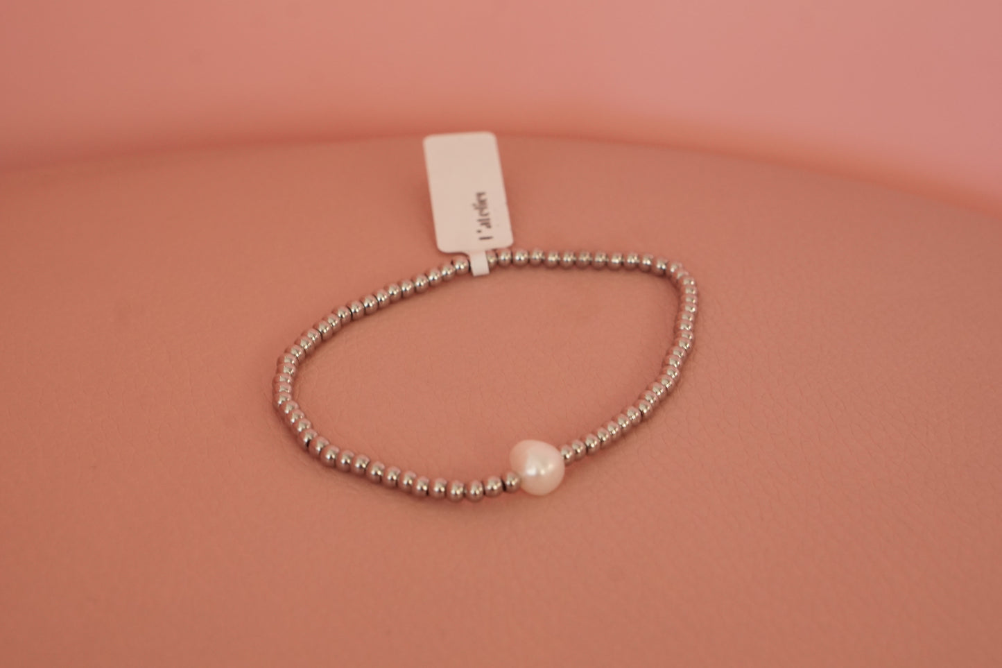 Pulsera elastica con perla y cuentas redondas