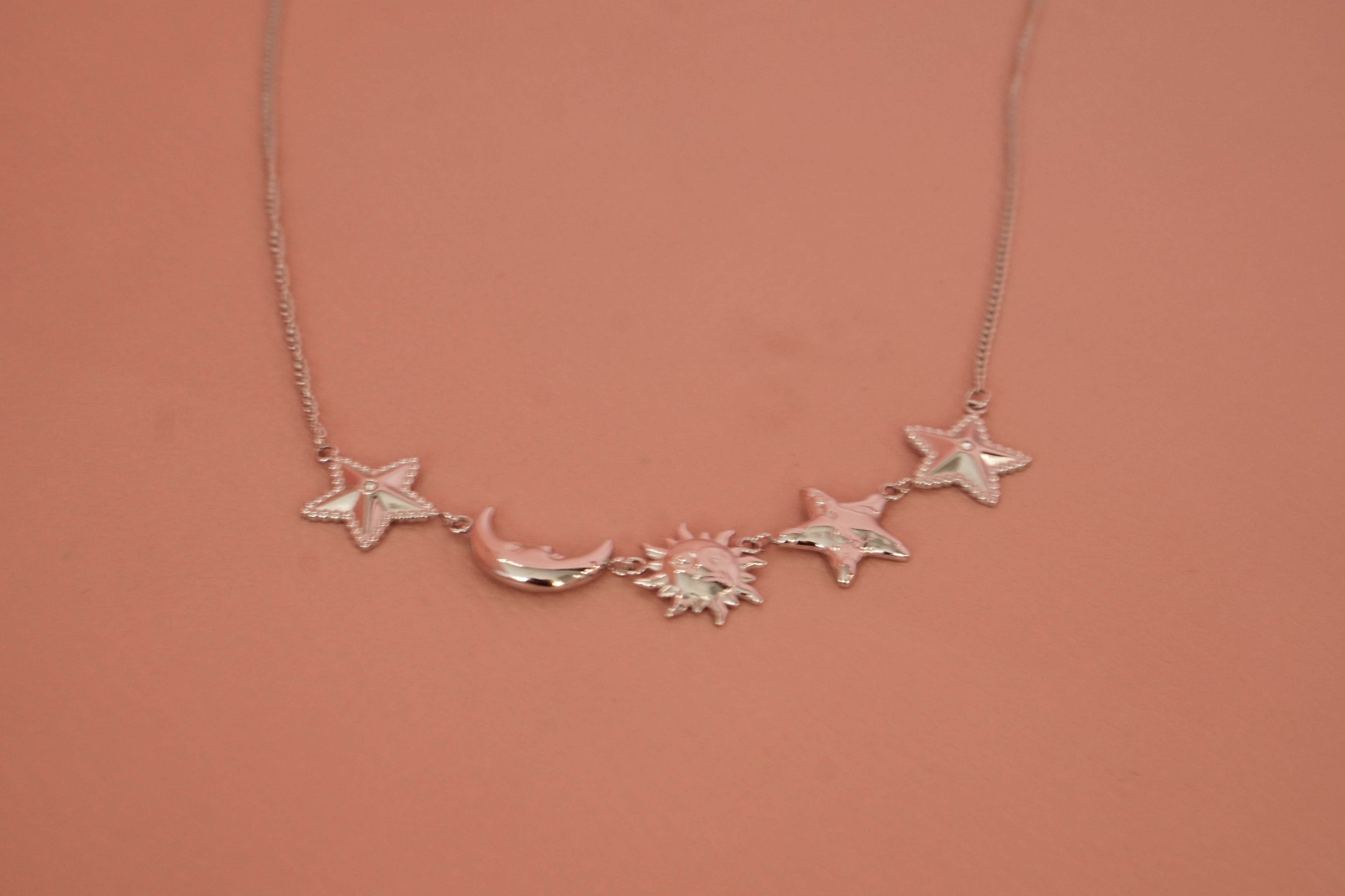 Collar de sol lunas y estrellas acero