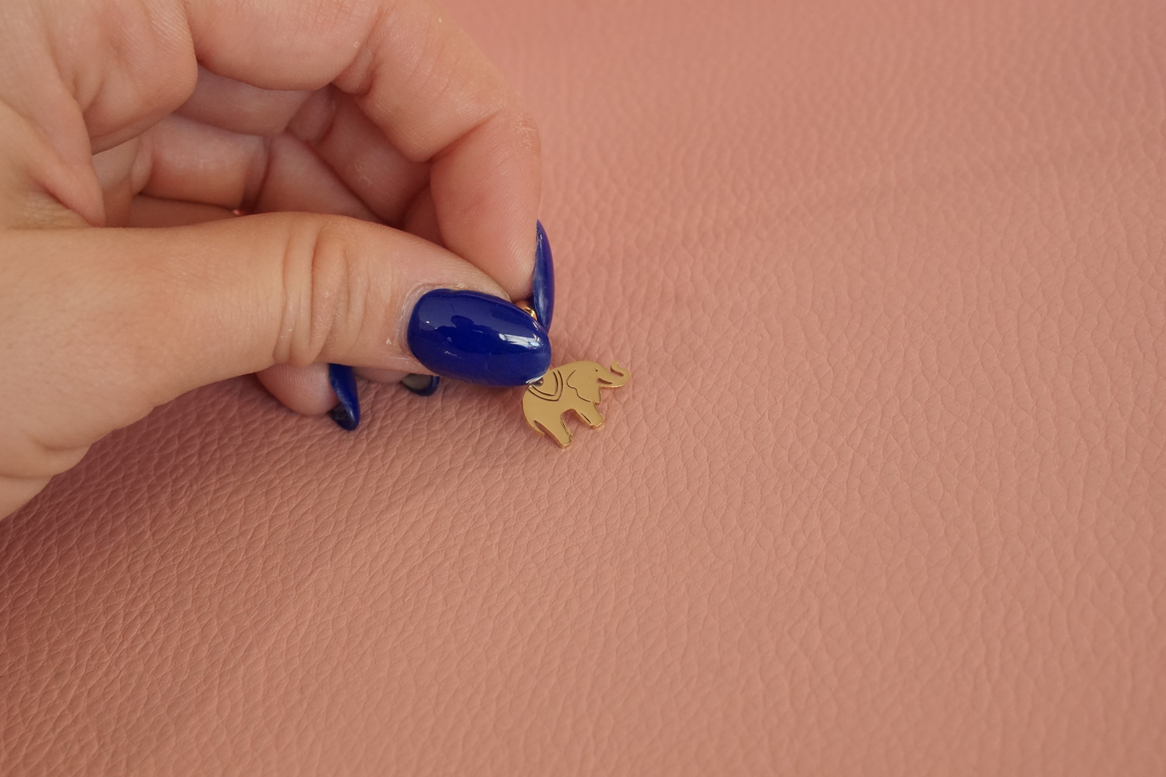 Dije elefante dorado premium acero