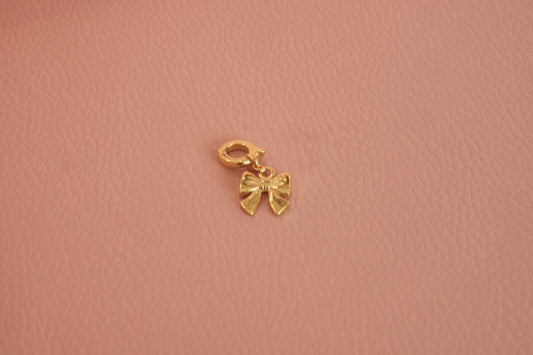Charm moño lazo acero inoxidable, premium