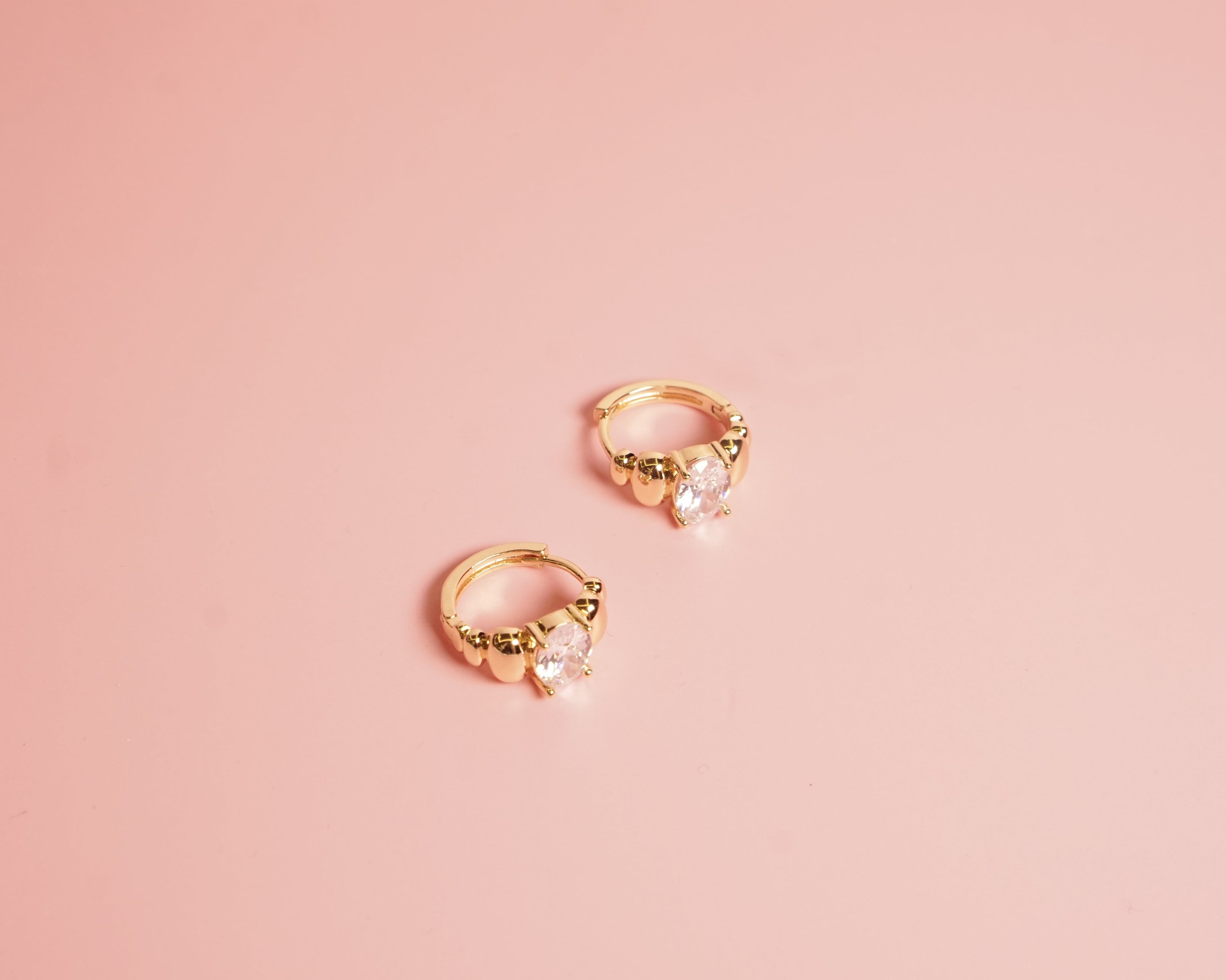 Arracada zirconia ovalada chapa de oro