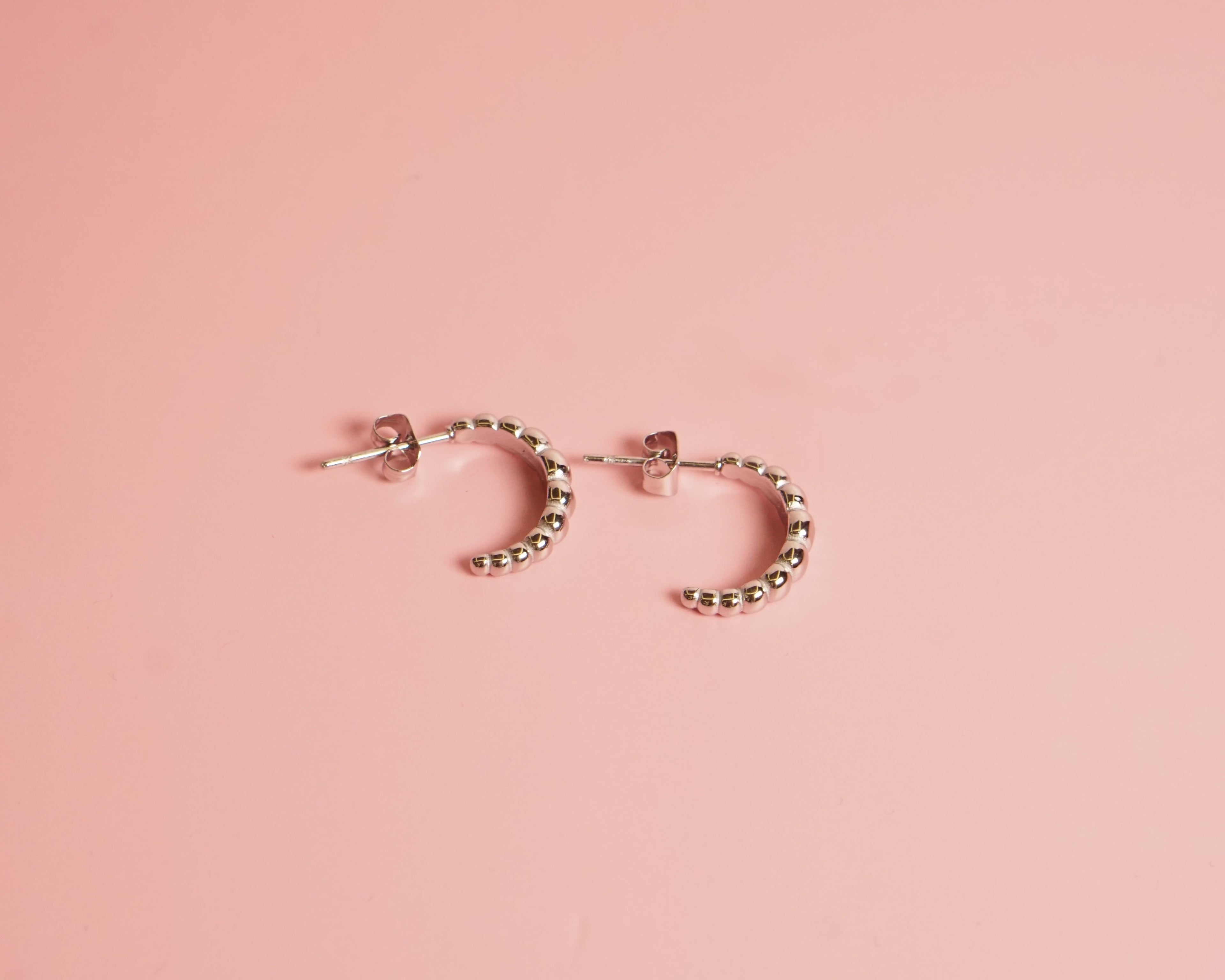 Croissant earrings acero