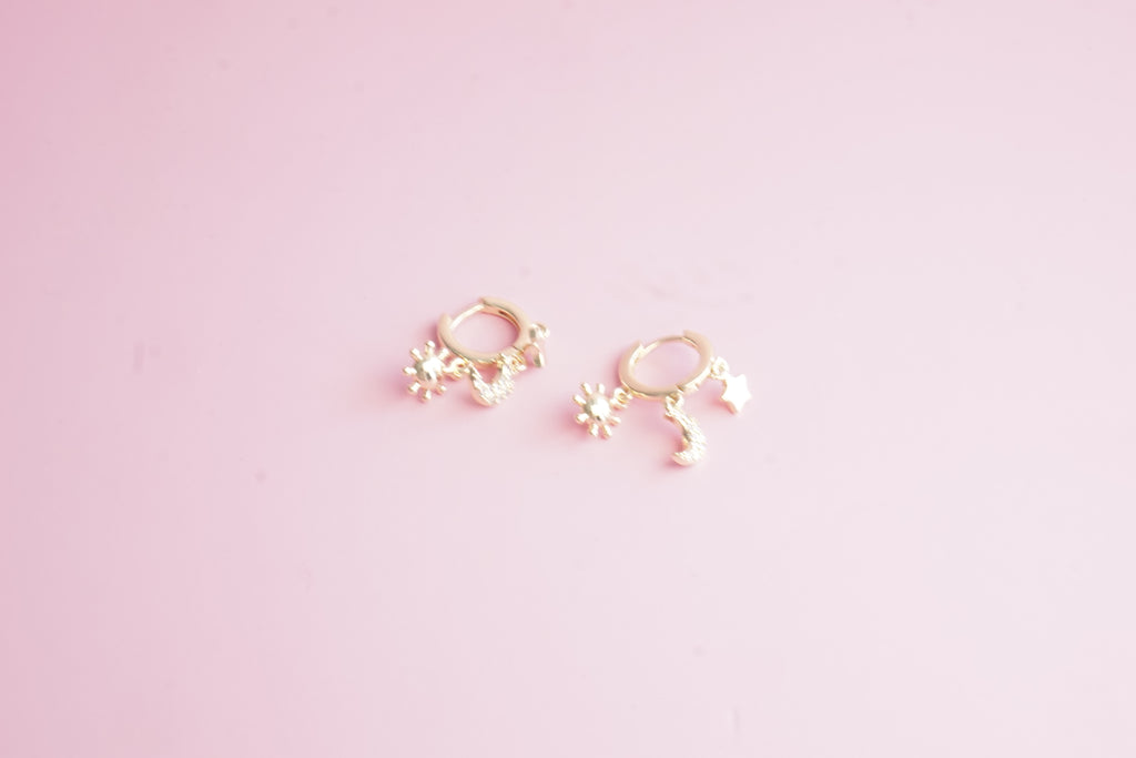 Huggies cosmic chapa de oro