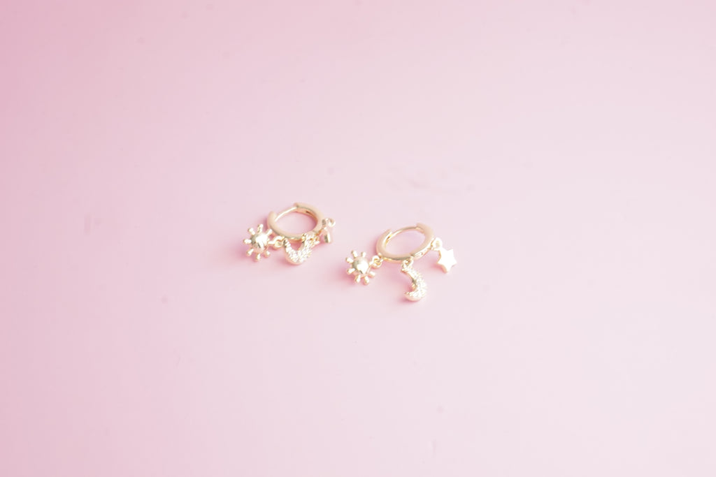 Huggies cosmic chapa de oro