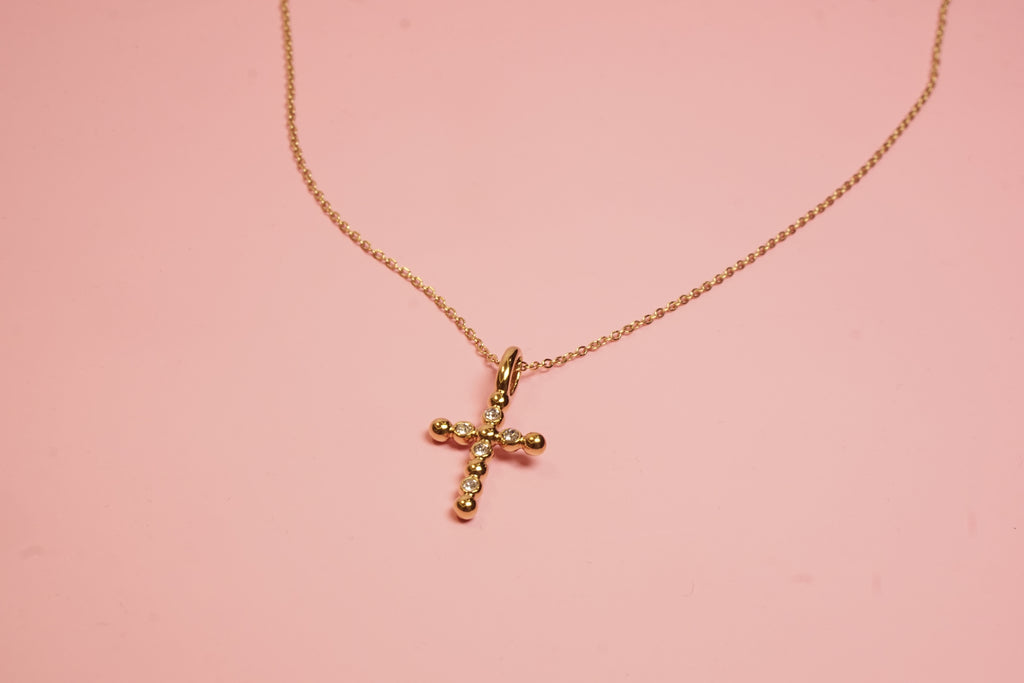 COLLAR CON DIJE DE CRUZ DE BOLITAS CON CRISTALES