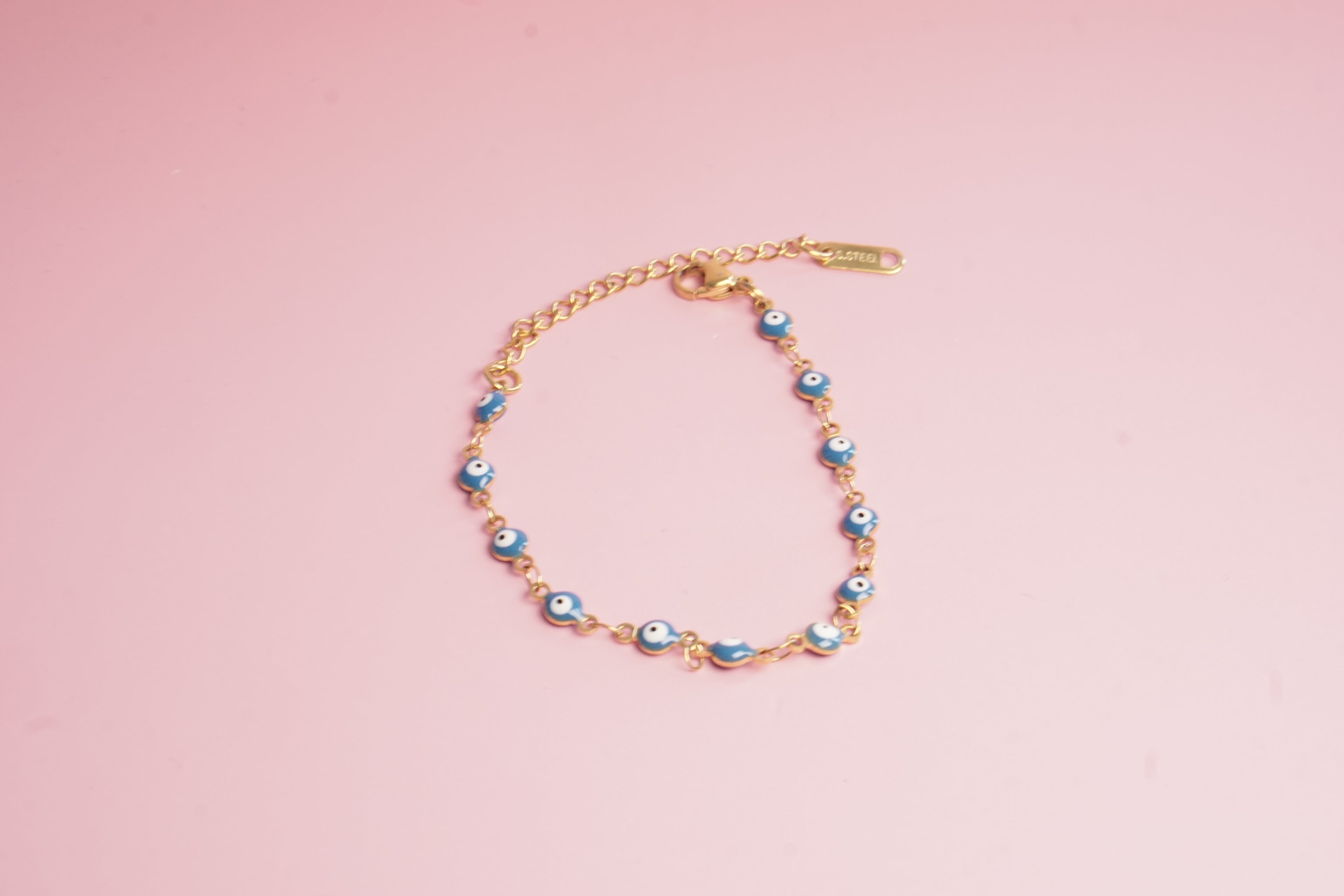 PULSERA DE OJITOS 4MM AZUL 15CM DORADO