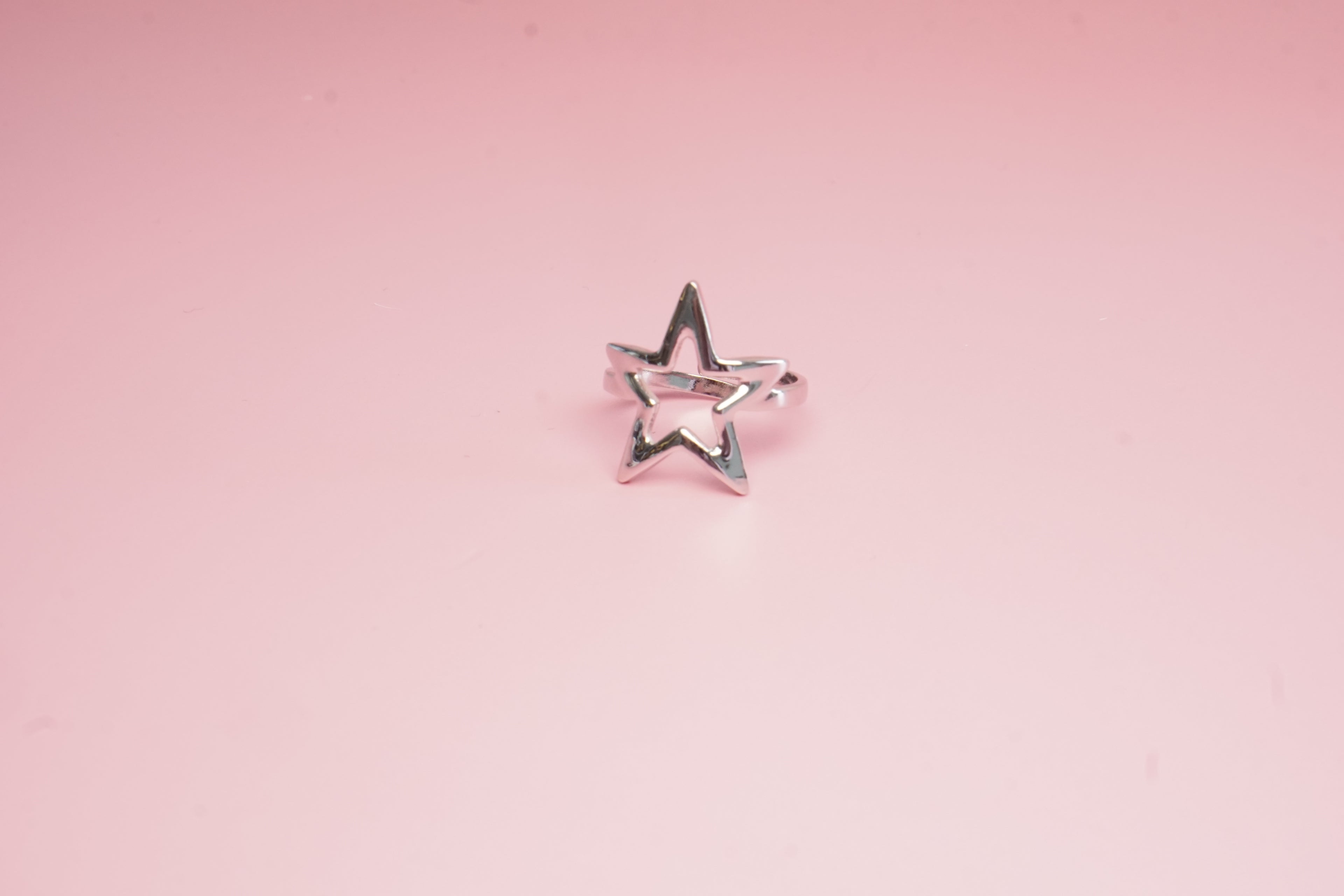 ANILLO AJUSTABLE CON SILUETA DE ESTRELLA 20MM