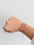 Pulsera tipo tennis delgada