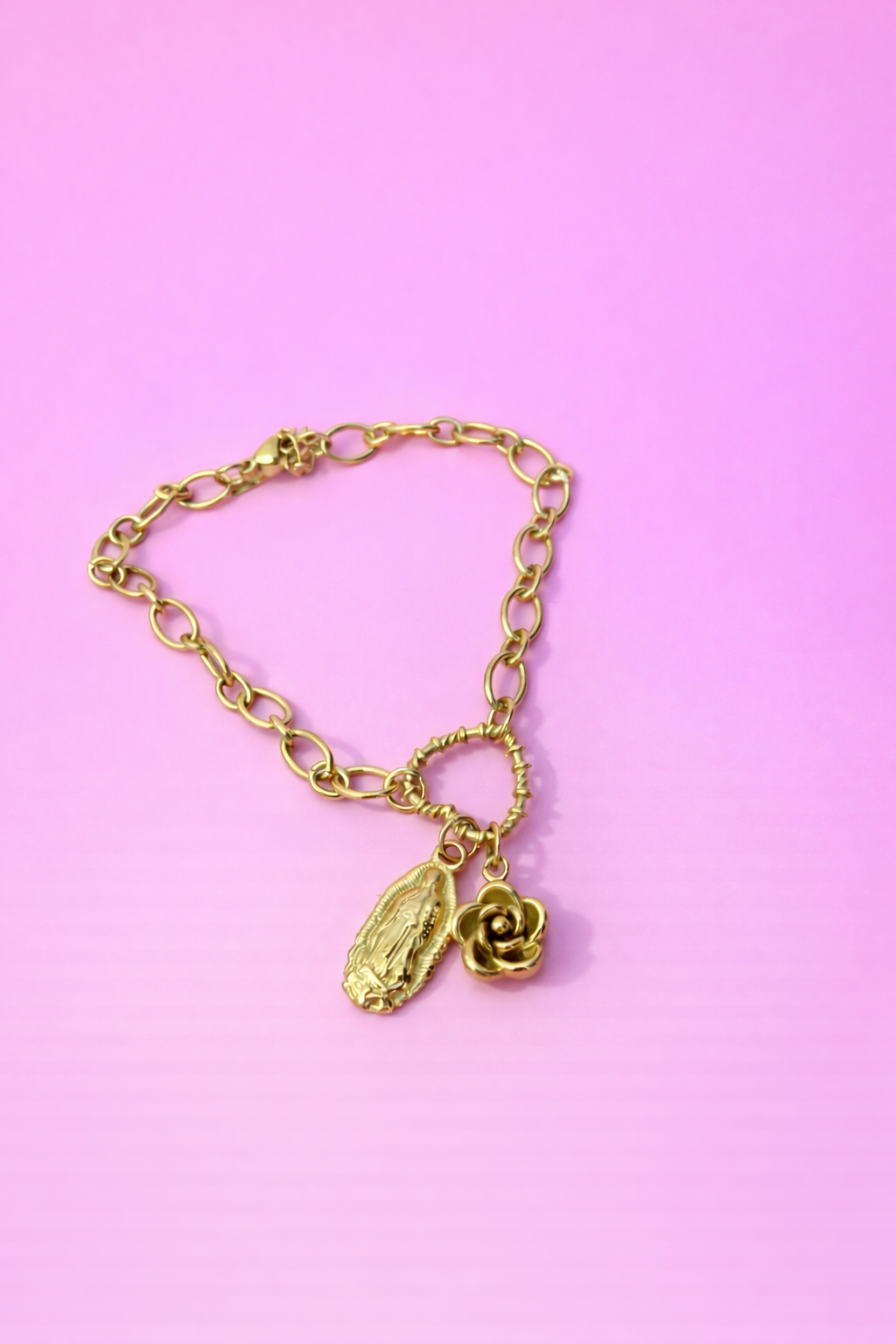 Pulsera acero virgen con flor y corazón