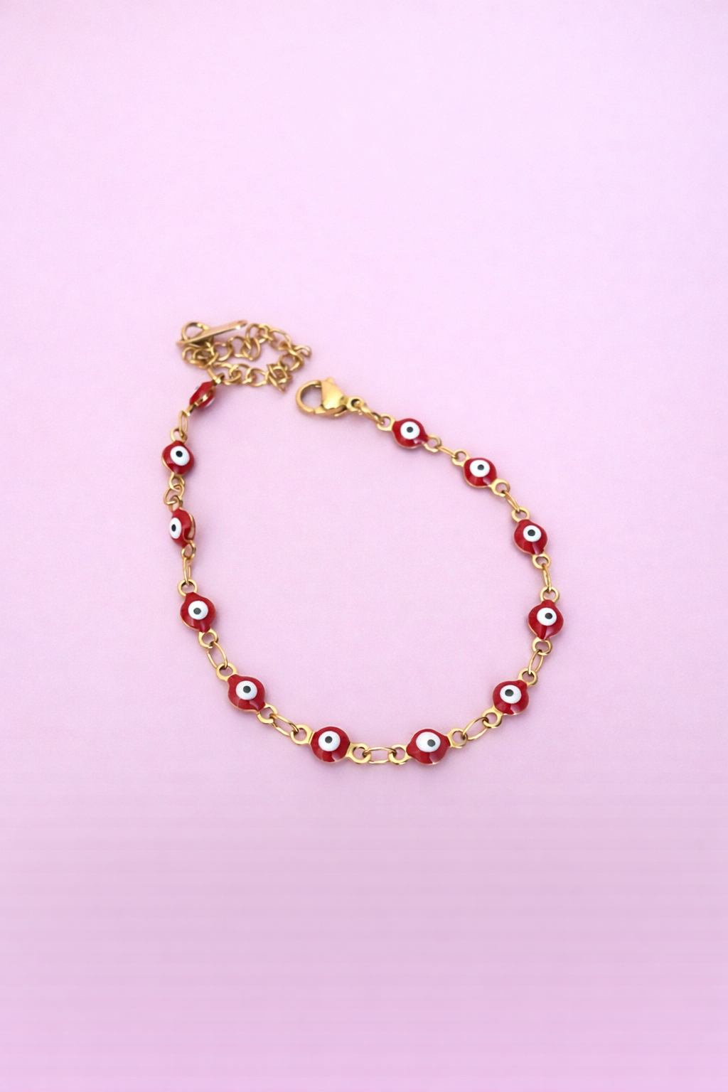 Pulsera ojitos rojos acero
