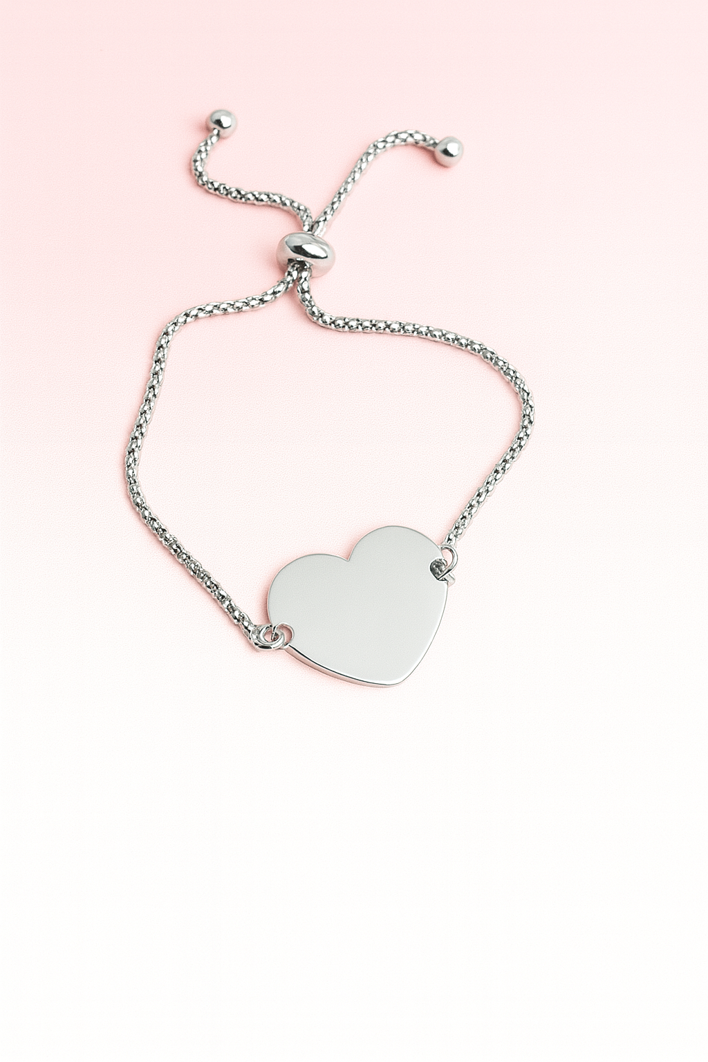 PULSERA CORAZON PLATEADO GRABADO