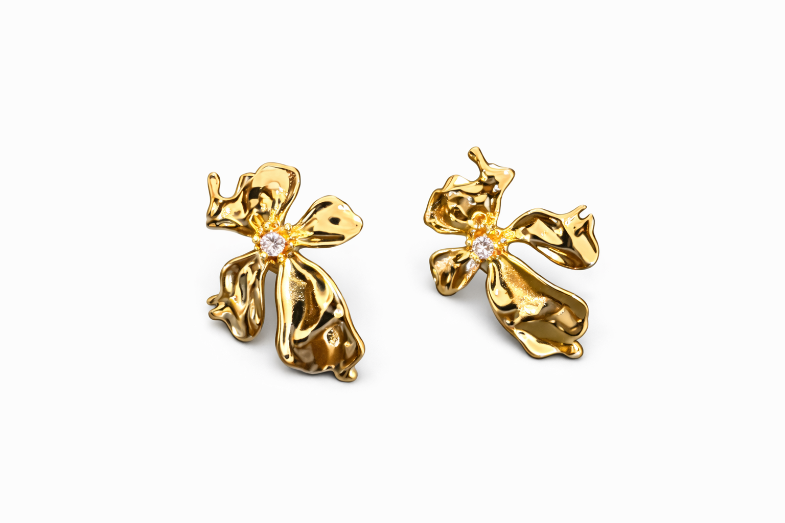 Aretes flor alargada ch14k zirconia
