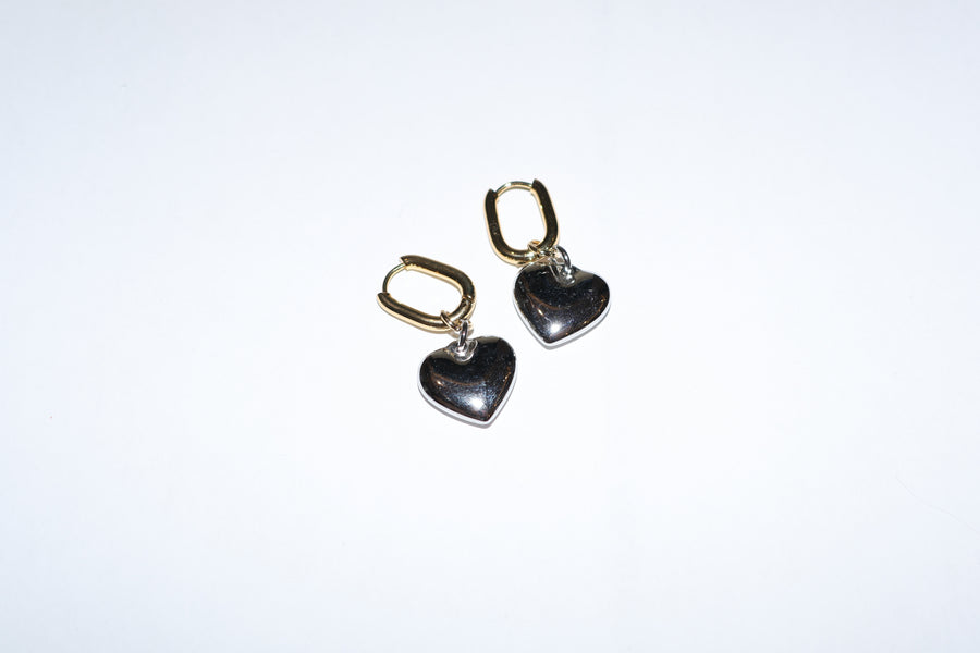 Aretes largos bicolor acero con corazon