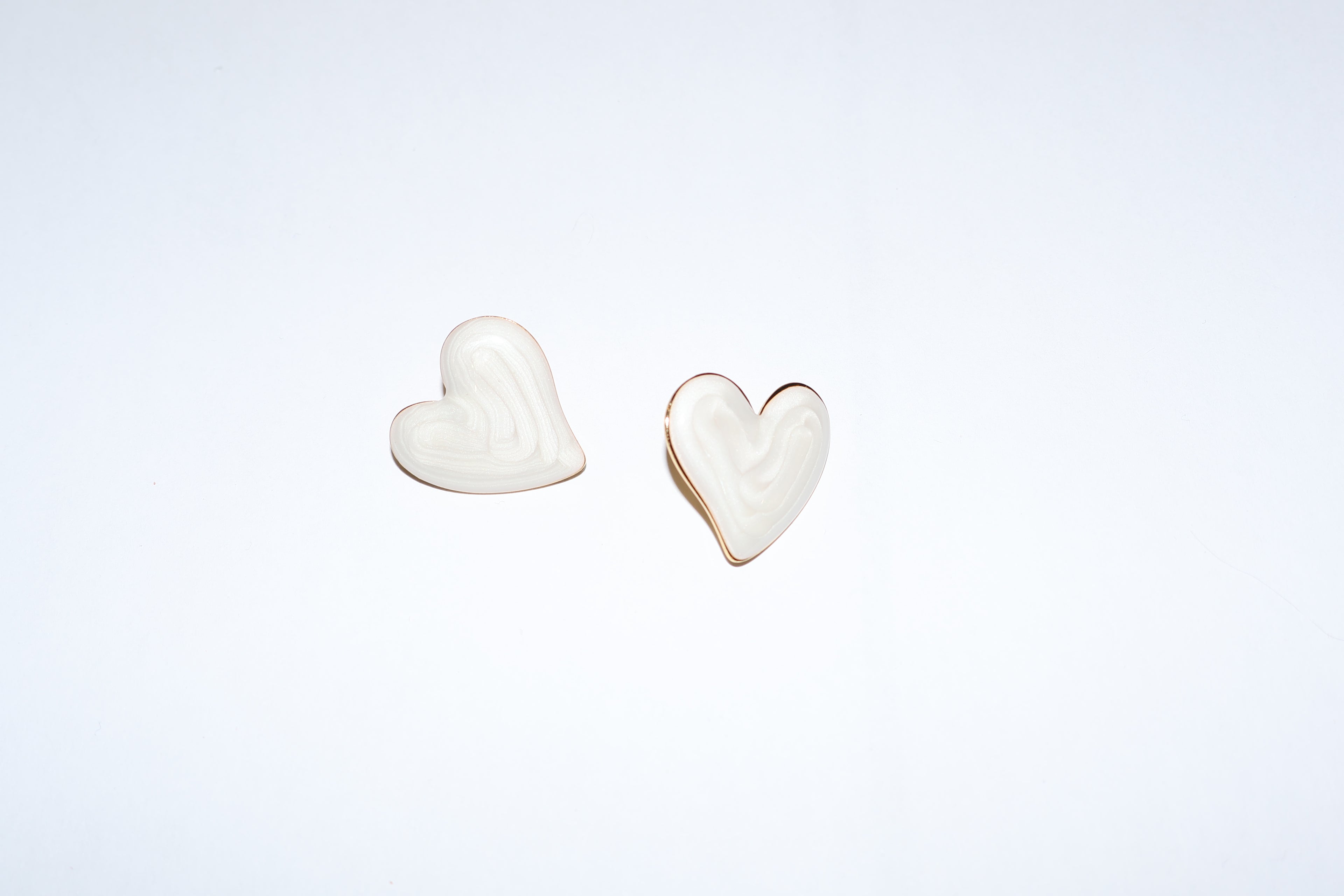 Aretes corazon blanco