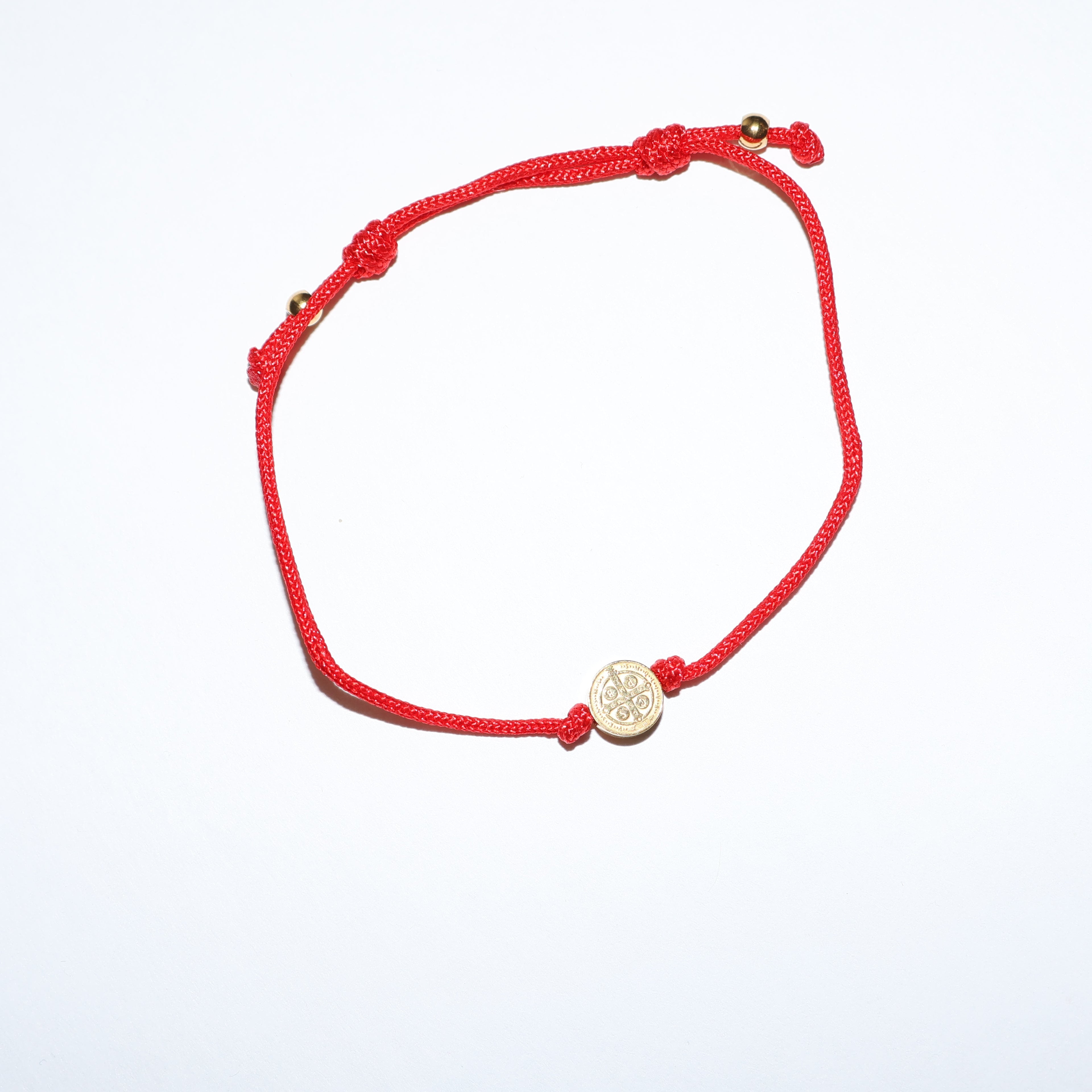 Pulsera san benito dorada de tela