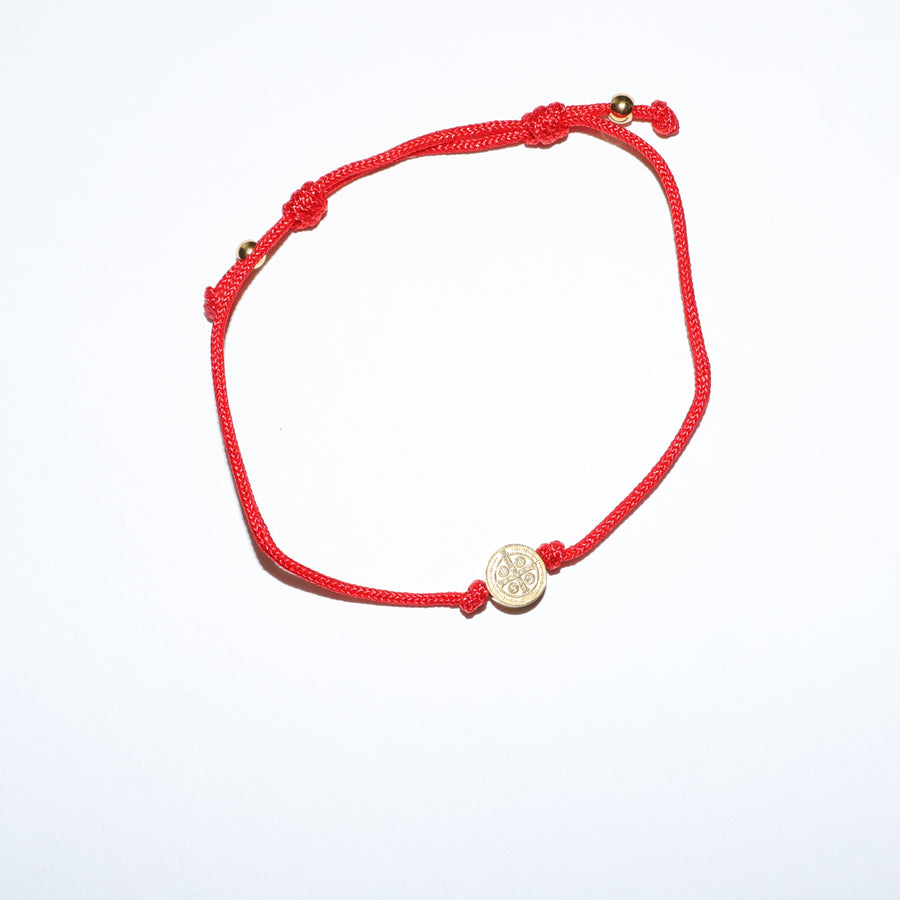 Pulsera san benito dorada de tela