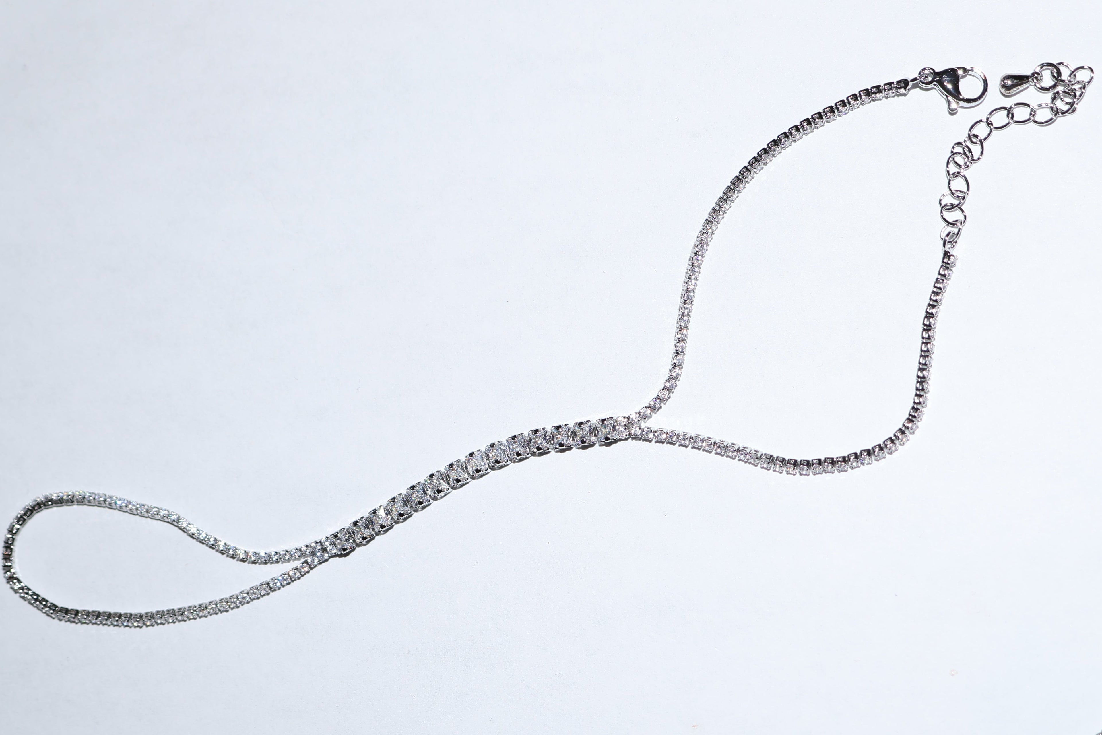 Handchain tipo tennis plateado