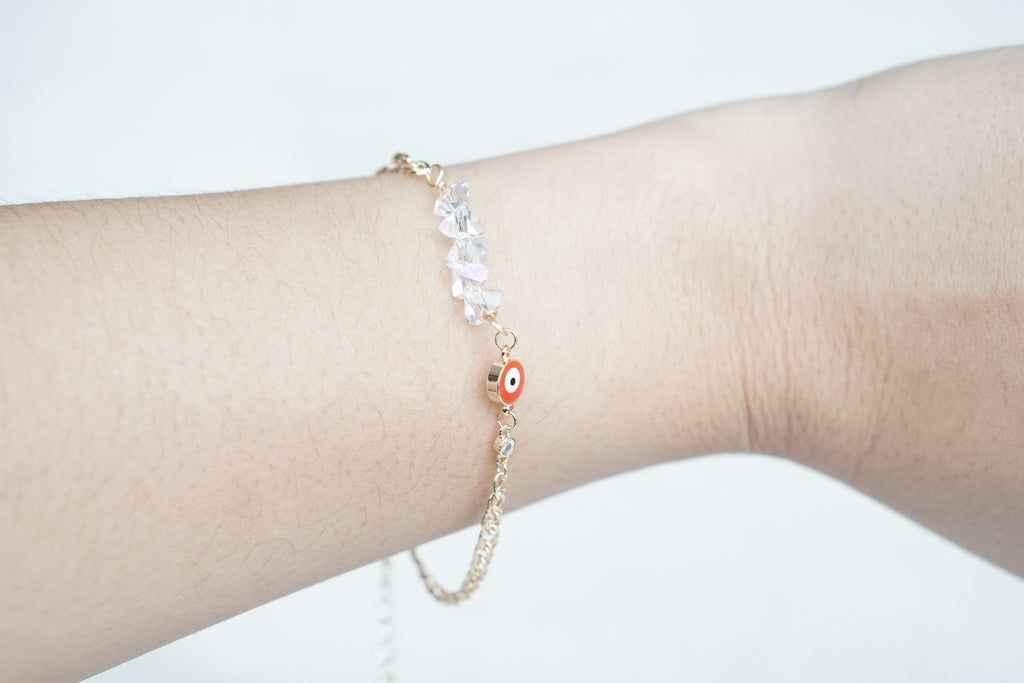 Twisted Cuban Bracelet with Iridescent Crystal Eye – Gold