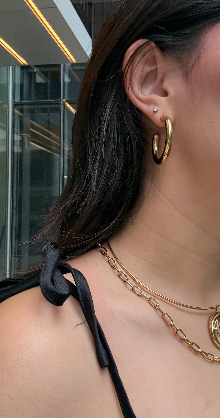 Media arracada tubular lisa  36 mm dorado acero