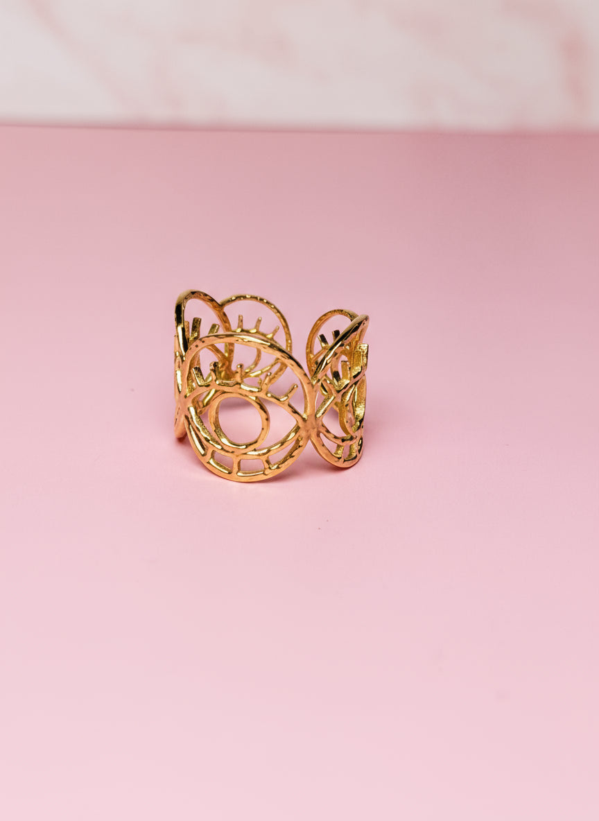 ANILLO AJUSTABLE CALADO CON SILUETA DE OJOS