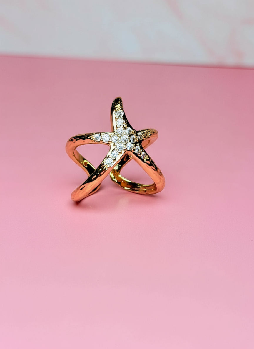 ANILLO AJUSTABLE CON ESTRELLA DE MAR TEXTURIZA