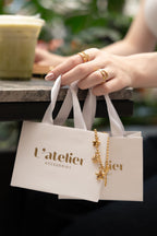 Collar con cadena balin  y dijes de estrella acero